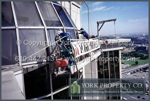 We specialize at sun damaged anodized aluminum storefront window frame cleaning, bleached anodized aluminum window frame cleaning, oxidized anodized aluminum cladding cleaning and pitted anodized aluminum panel painting.