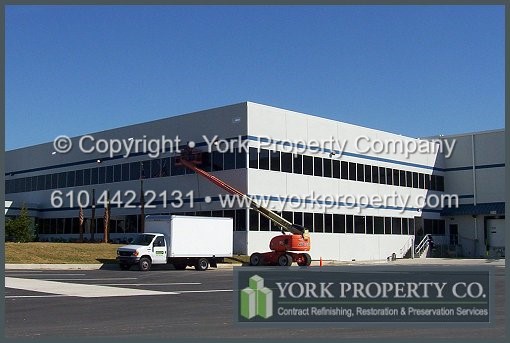 Architectural metal refinishing specialists cleaning anodized aluminum, washing anodized aluminum, pressure cleaning anodized aluminum and refinishing anodized aluminum.