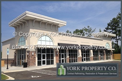 Mold and mildew stained stainless steel building facade cleaning contracting company. Local contractor refinishing caulking stained anodized aluminum window frames, washing mold off of anodized aluminum railings, restoring faded anodized aluminum panels and refinishing discolored anodized aluminum storefront windows and doors.